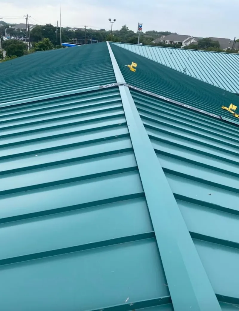 Green commercial metal roof ridge and valley for Metal Roof Repair in Wekiwa Springs